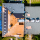 An apartment building roof was repaired by replacing old roof with new shingles - PhotoDune Item for Sale