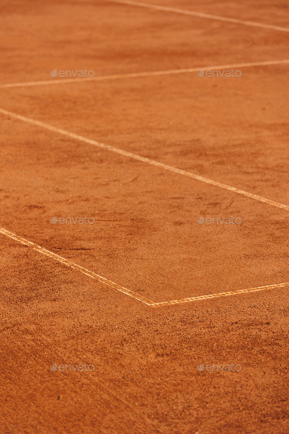 tennis court made of red clay or soil with markings for game or  competition. sports and recreation Stock Photo by myjuly