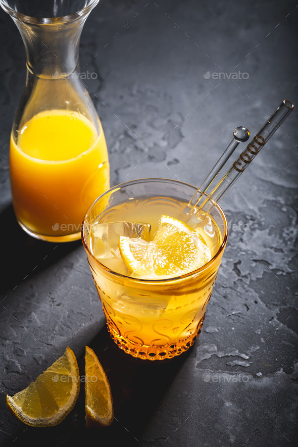Ginger and lemon refreshing lemonade or cocktail, immunotherapy drink - Stock Photo - Images