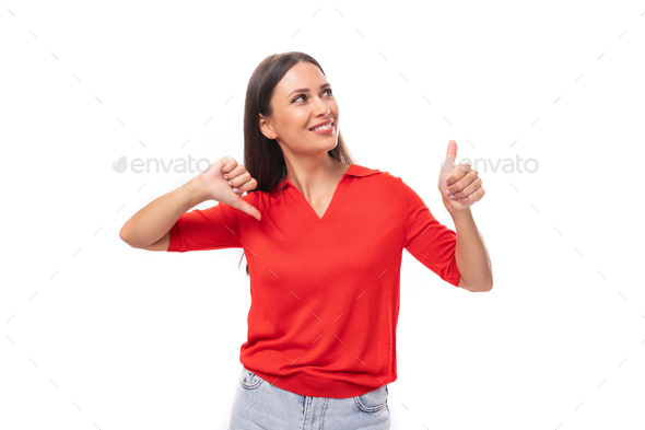 young brunette lady dressed in a red t-shirt shows like and dislike