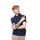 handsome 25 year old blond male with tattoos in a striped polo points his finger to the side - PhotoDune Item for Sale