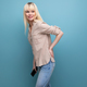 pretty blonde woman in casual outfit on studio background - PhotoDune Item for Sale