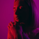 Woman dreaming in studio in neon light - PhotoDune Item for Sale