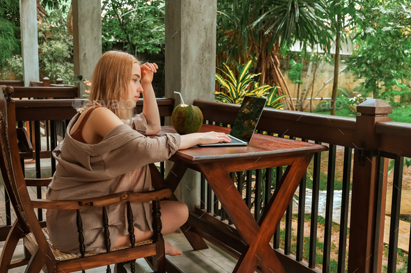 Business.woman working using laptop outdoors home garden.Remote work freelancer travel.cozy green wo - Stock Photo - Images