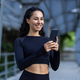 Young beautiful woman using phone, sportswoman smiling and resting after running and doing active - PhotoDune Item for Sale