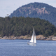 Sailboat in Canadian Landscape by the ocean and mountains. - PhotoDune Item for Sale