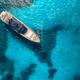 Aerial view of luxury yacht on blue sea at sunset in summer - PhotoDune Item for Sale