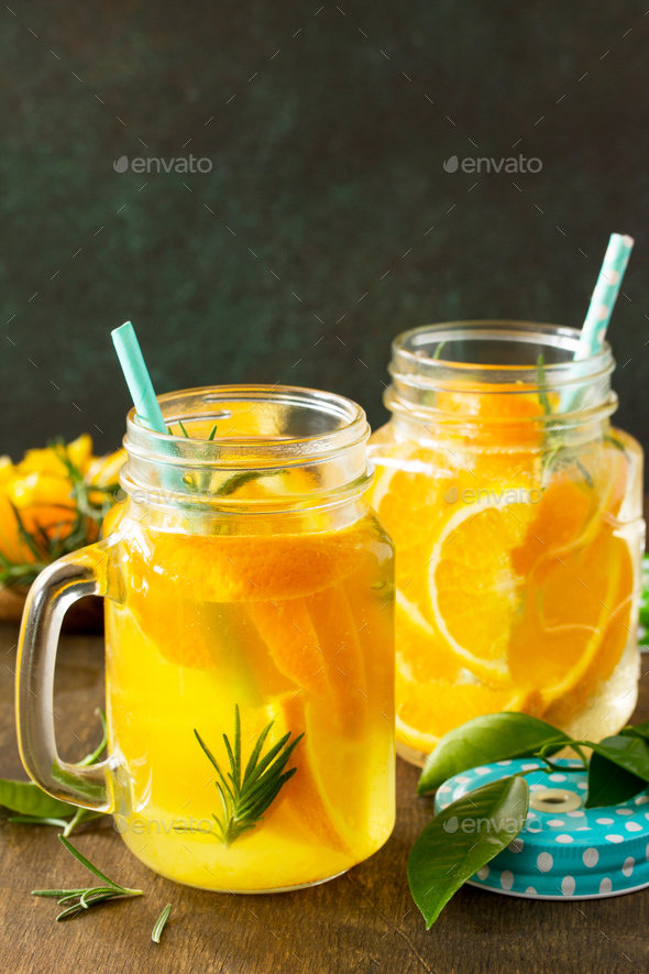 Refreshing summer berry Lemonade, lemon mint Tea and orange Lemonade with rosemary. Copy space. - Stock Photo - Images