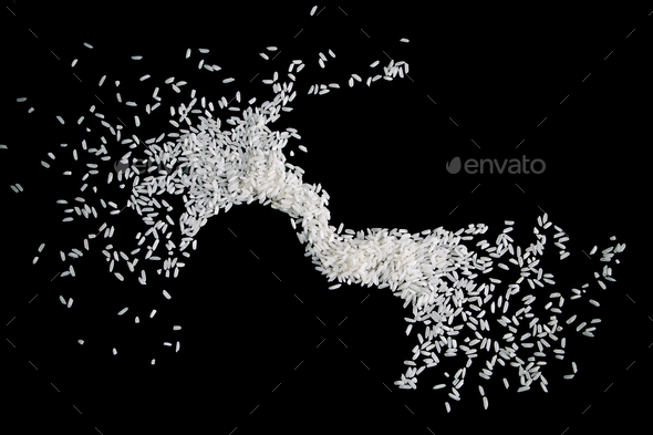 Raw white rice splash on black background. Uncooked rice explosion. - Stock Photo - Images