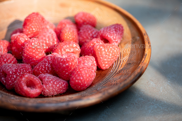 raspberries in a bowl  - Stock Photo - Images