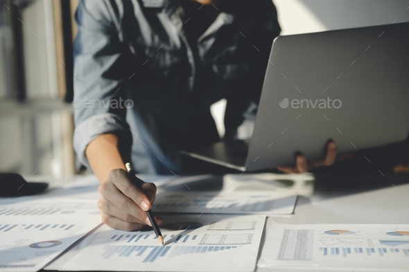 Close up of businessman is analyzing the stock marketing on computer.  - Stock Photo - Images