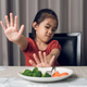 Little cute kid girl refusing to eat healthy vegetables. Children do not like to eat vegetables. - PhotoDune Item for Sale