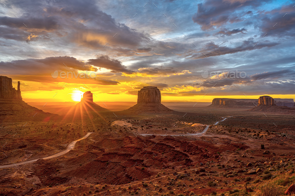 Amazing sunrise in the famous Monument Valley - Stock Photo - Images