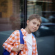caucasian boy walking from school wearing school bag. Begining of academic year - PhotoDune Item for Sale