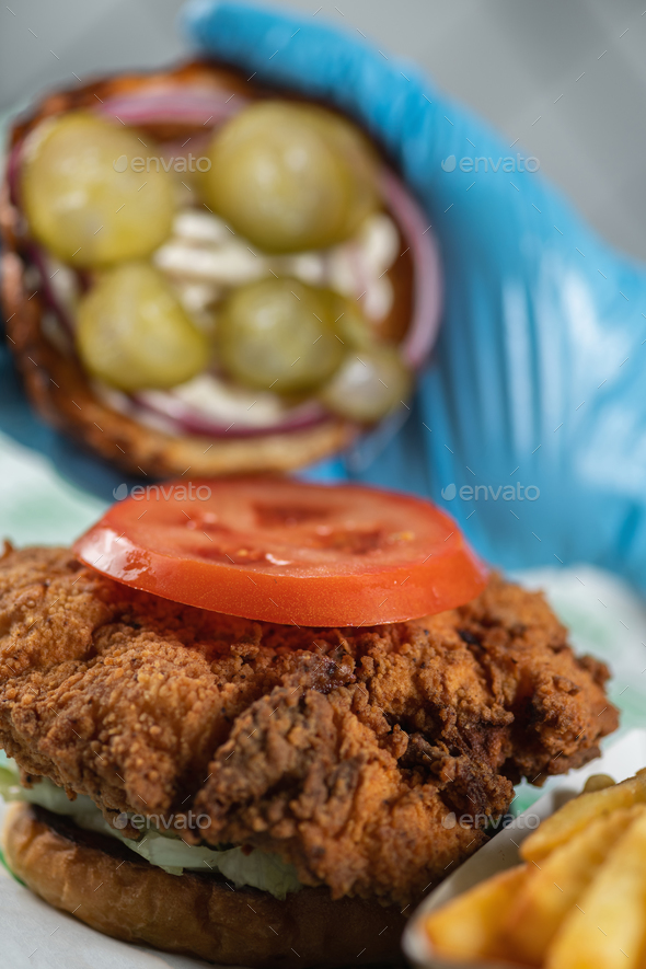 Fried Chicken with Various Toppings, Condiments and French fries - Stock Photo - Images