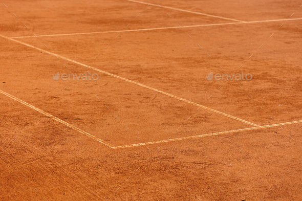tennis court made of red clay or soil with markings for game or competition. sports and recreation - Stock Photo - Images