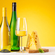 Various cheese on board and white wine - PhotoDune Item for Sale