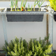 Growing own herbs and vegetables in little garden on balcony.  - PhotoDune Item for Sale