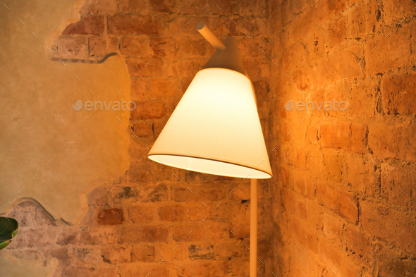a lamp in home against old wall  - Stock Photo - Images