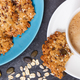 Cup of white coffee and fresh baked oatmeal cookies with honey and healthy seeds - PhotoDune Item for Sale