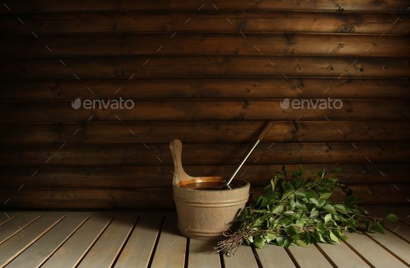 A Finnish sauna scene with a 'vihta' (bath whisk) ready for bathers. Stock  Photo by wirestock