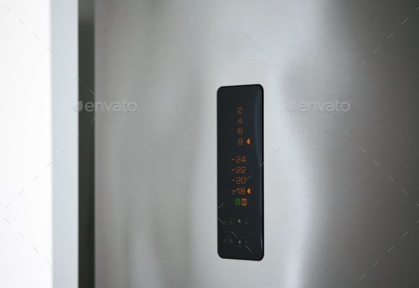 Closeup shot of the digital numbers electronic display stainless steel on a smart refrigerator