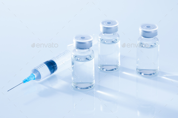 Photo of photos of ampoules for injection on white background Stock ...