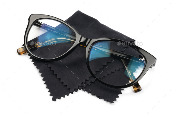 Glasses on black lens wipes - Stock Photo - Images