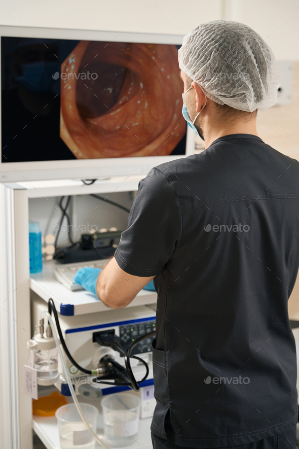 Experienced endoscopist performing endoscopic ultrasound of esophagus