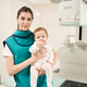 Young mother and her little child in radiography room - PhotoDune Item for Sale