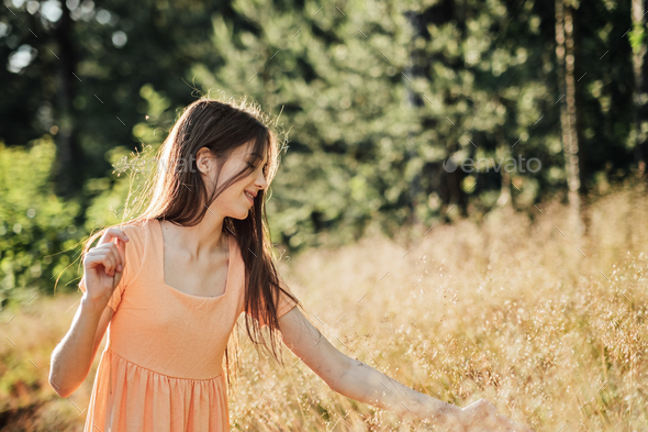 Enjoy a healthy, fun and happy summer. Outdoor portrait of happy smiling young woman in nature - Stock Photo - Images