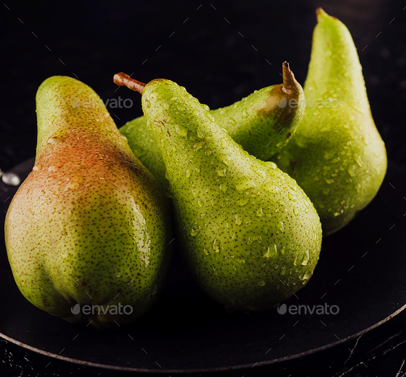 Fresh organic pears on a white background