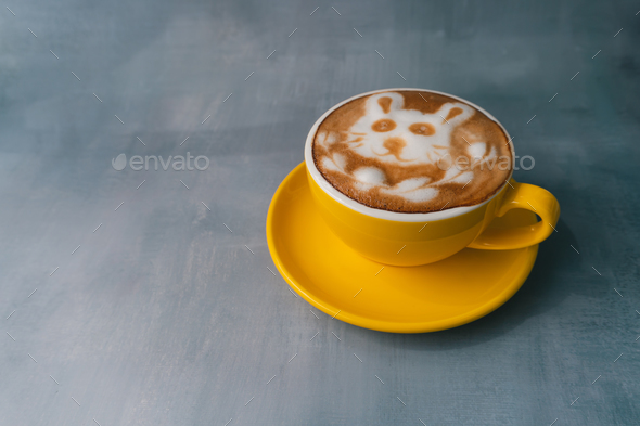 yellow cup of latte coffee art, cute rabbit and lover animal,relax refresh, active color. - Stock Photo - Images