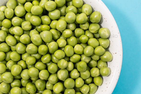Close up of Fresh green peas in bowl - Stock Photo - Images