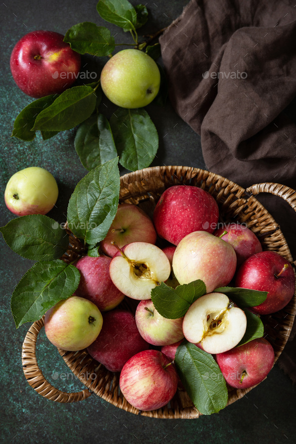 Basket of ripe apples on a stone table. View from above. Copy space. - Stock Photo - Images