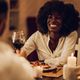 Portrait of an african american woman having a romantic date at home with her boyfriend - PhotoDune Item for Sale