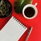 Notepad and pen with coffee cup and plant  - PhotoDune Item for Sale
