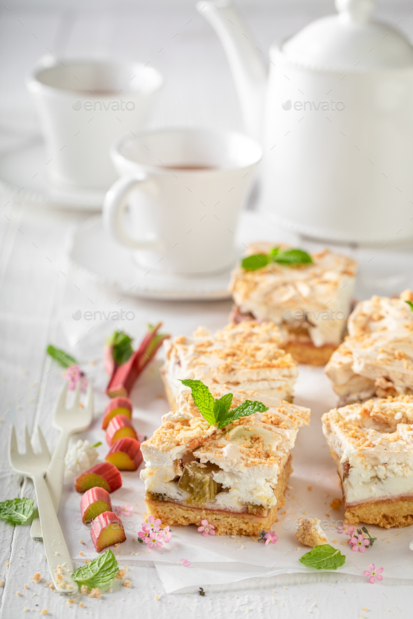 Delicious rhubarb yeast cake made of sugar and fruits. - Stock Photo - Images