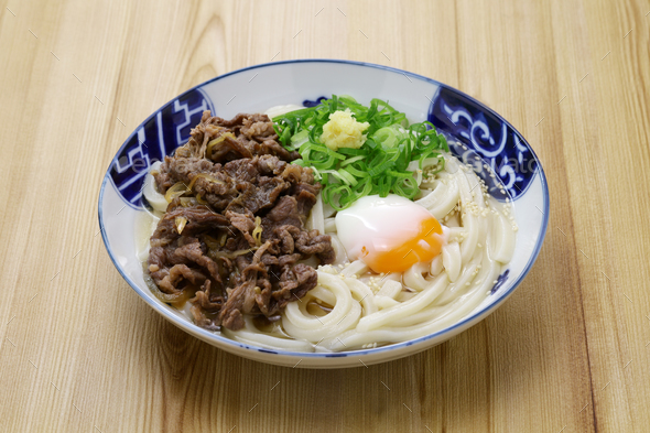 Sanuki udon with beef and soft-boiled egg, Japanese noodle dish - Stock Photo - Images