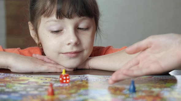 Happy Child with Board Game alt