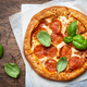 Hot pepperoni pizza with spicy salami sausage, mozzarella cheese, tomato sauce and green basil - PhotoDune Item for Sale