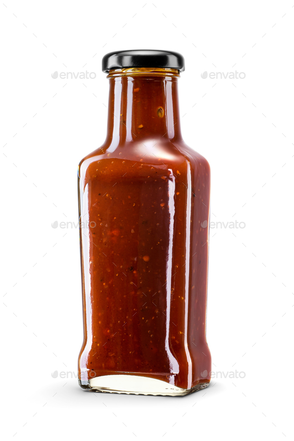 Glass bottle of tomato barbecue sauce isolated on white with clipping path. Popular condiment. - Stock Photo - Images