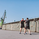 Two men do boxing training on roof of the building in industrial city - PhotoDune Item for Sale