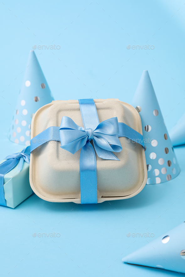 Concept of congratulation and celebration with bento cake in box