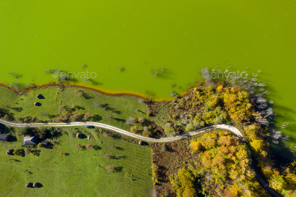 Aerial View of Green Mining Waters from a Copper Mine Flooding Natural Habitat