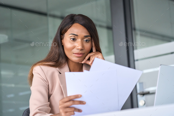 Busy business woman execuitve manager checking documents working in office. - Stock Photo - Images