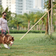 Woman Playing with Samoyed Dog - PhotoDune Item for Sale