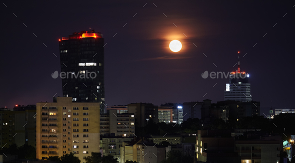 Full moon over city of Szczecin, Poland. - Stock Photo - Images