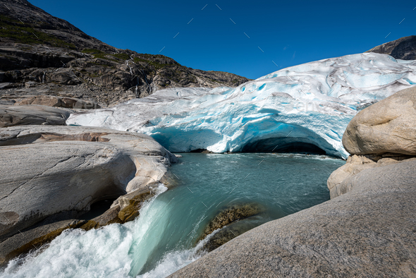 Melting Glacier Nigardsbreen Nigar Glacier arm of Jostedalsbreen located in Gaupne Jostedalen valley - Stock Photo - Images