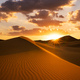 Sunset over the sand dunes in the desert. Arid landscape of the Sahara desert. - PhotoDune Item for Sale